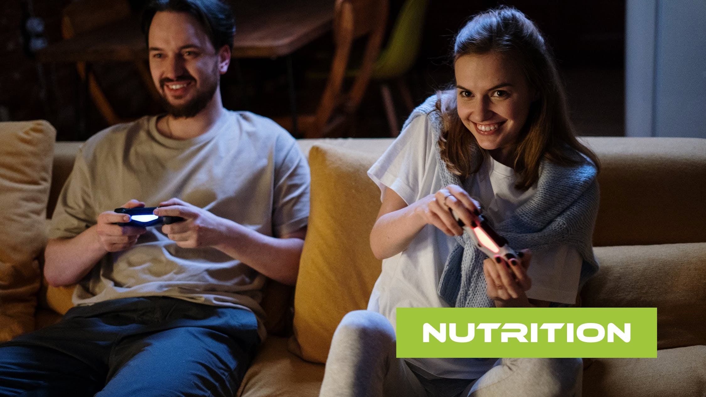 Couple with controllers on the couch